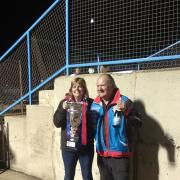 SOMERSET Rebels promoter Debbie Hancock and team manager Garry May lift the KO Cup