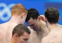 EMOTIONAL: Great Britain's James Guy (centre) and Tom Dean celebrate gold in the Men's 4x200 freestyle relay at the Tokyo 2020 Olympic Games (pic: Joe Giddens/PA Wire)