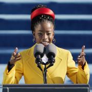 WOW: American poet Amanda Gorman reads a poem during the 59th Presidential Inauguration at the US Capitol in Washington. PICTURE: AP Photo/Patrick Semansky