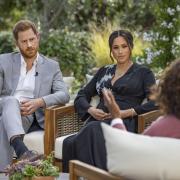 TORN APART: Prince Harry and Meghan, Duchess of Sussex, in conversation with Oprah Winfrey (pic: Joe Pugliese/Harpo Productions via AP)