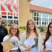 Students celebrate receiving their A-level results in Highbridge yesterday. Pictures: The King Alfred School Academy