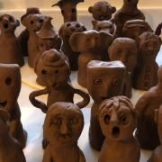 Some of the ceramic figures made at a previous Individuality Project held in Cheddar.