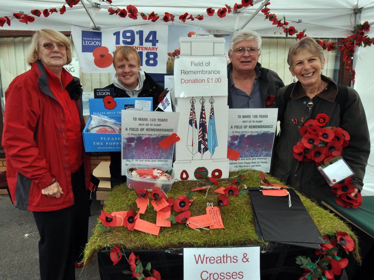 THE British Legion poppy stall, with Poppy organizer
Gaynor Brown, Jonathon Smith, Mike Barnard and Sue
Meads. PHOTO: Mike Lang