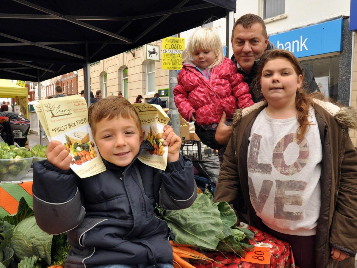 ARCHIE, Mark, Ruby and Ellie-May Kidner at the Cossey
Produce stall. PHOTO: Mike Lang