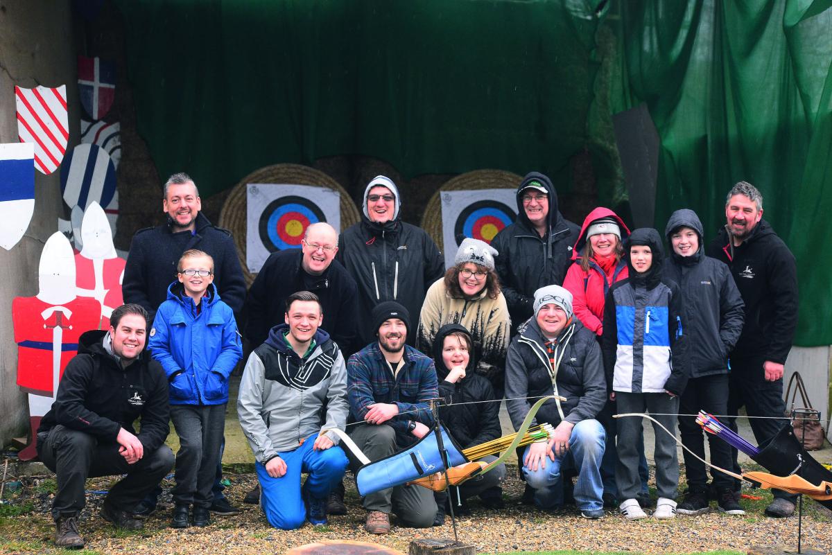 TOGETHER: A photo of the group on the archery range at Wall Eden Farm