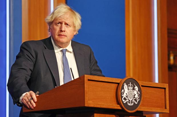 Burnham and Highbridge Weekly News: NEW RULES: Boris Johnson outlined the Government's Plan B rules yesterday (Image: PA Features Archive/Press Association Images)