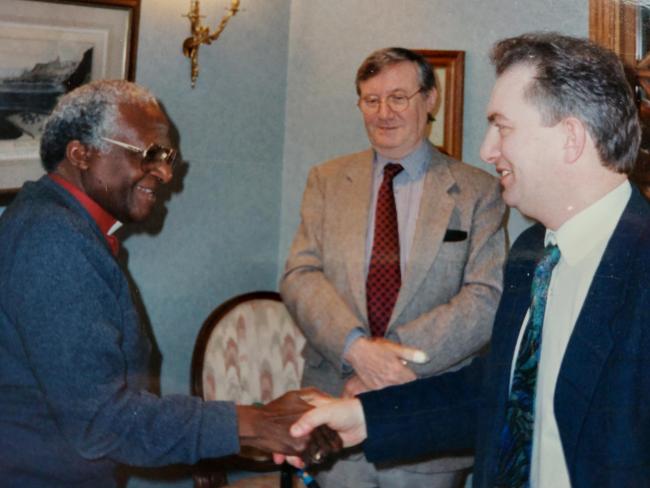 Producer Mike Ford (right) meeting Archbishop Desmond Tutu in the 1990s with the then Radio 4 'Sunday' presenter Colin Morris (centre)