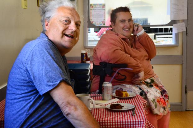 Burnham and Highbridge Weekly News: Kevin Powell and Rosemary Mundy enjoy cakes and refreshments at the cafe.