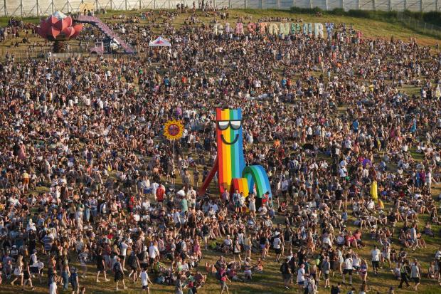 Burnham and Highbridge Weekly News: Glastonbury attendees enjoyed warm weather on the first day of the event (PA)