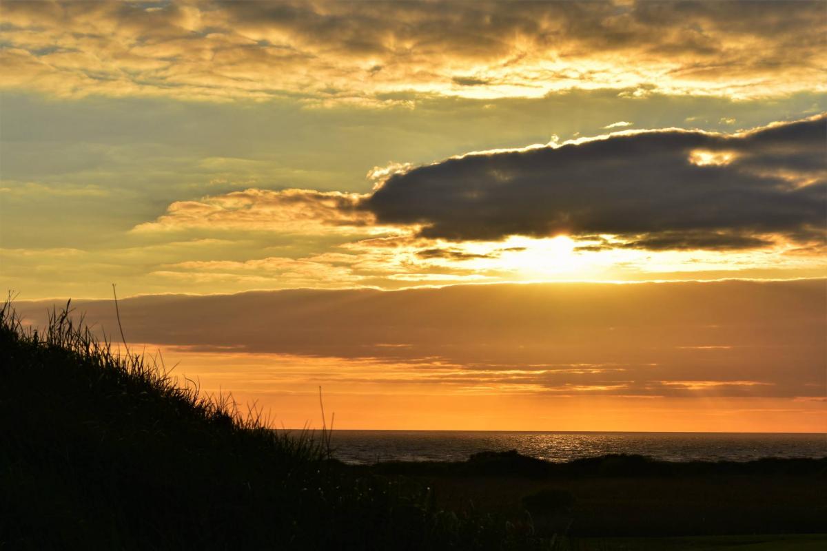 Sunset from the golf course at Berrow by Andy Linthorne. PUBLISHED: April 20, 2017